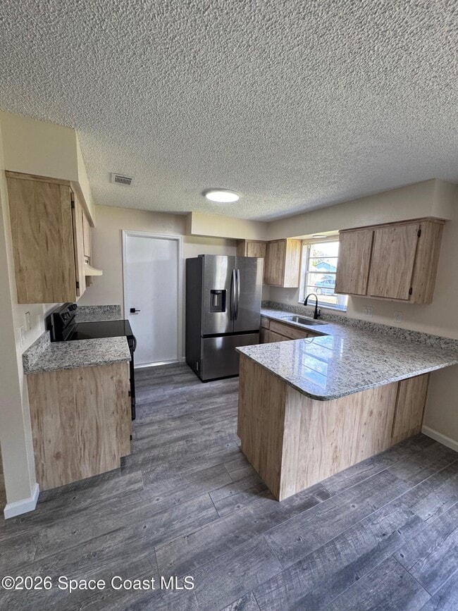 Building Photo - 1717 Bruman Terrace