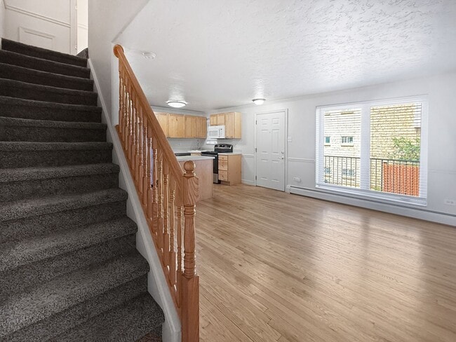 Building Photo - $0 DEPOSIT OPTION. CHEESMAN PARK! TWO STORY CONDO! ADDITIONAL HALF BATH ON MAIN LEVEL! PARKING, H...