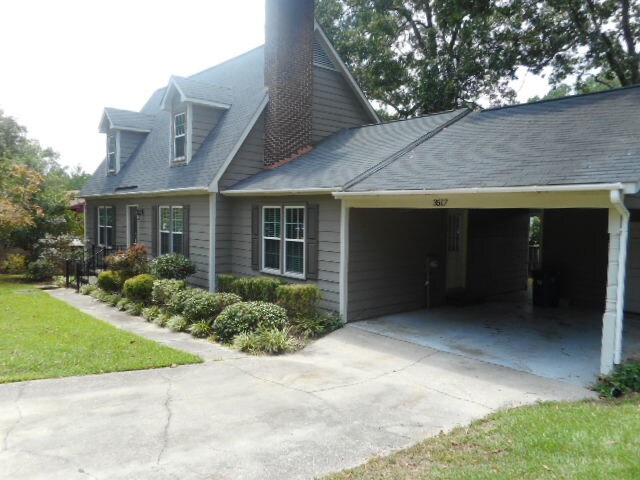 Carport with outside storage. - 3517 Barron Way