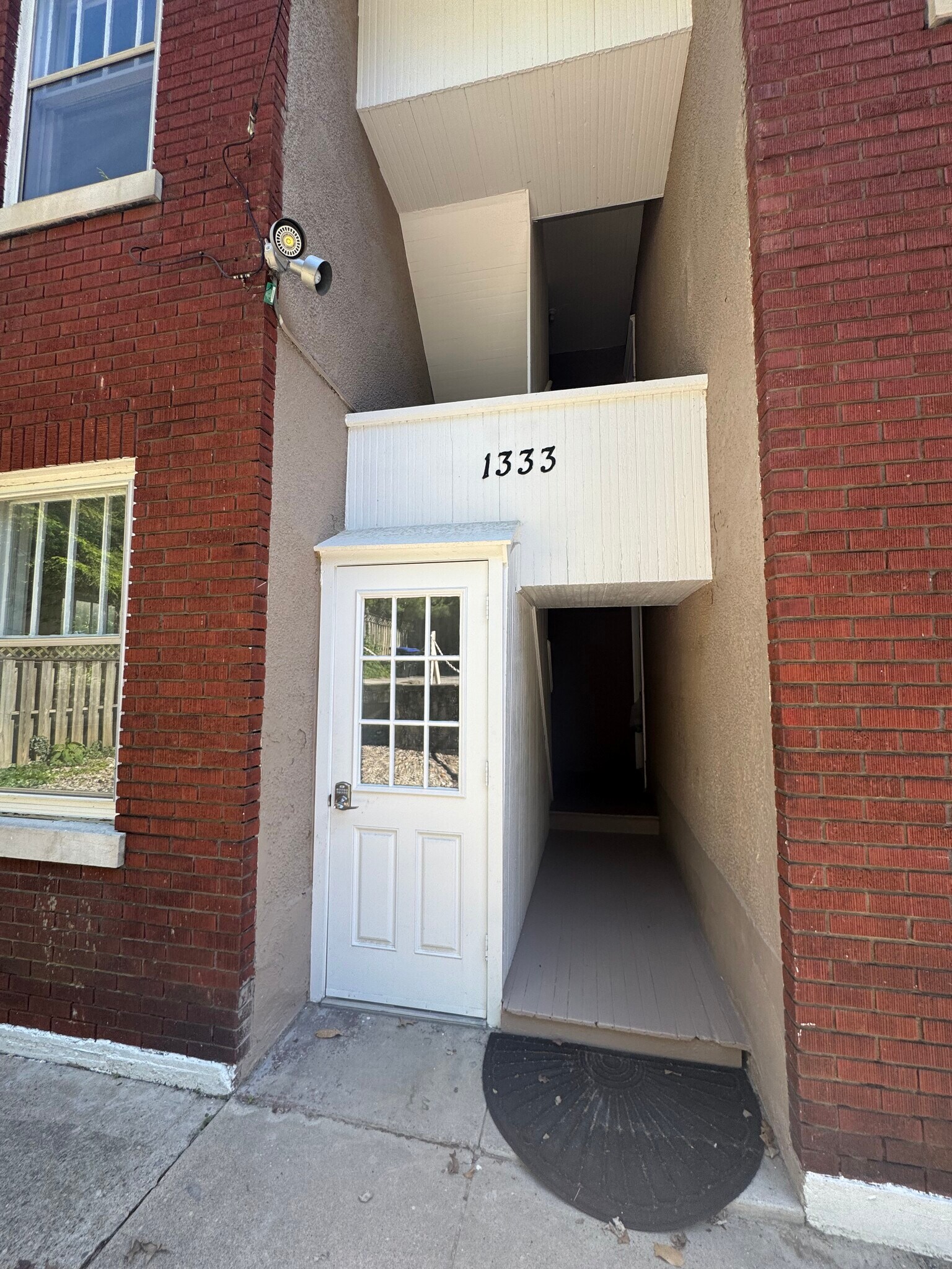 Access to rear stairwell + basement entry (keypad entry) - 1333 Castlewood Ave