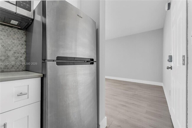 Building Photo - 6647 SW 59th Pl