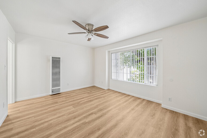 2BR, 1BA - 868SF - Living Room - Garden Villas Apartments
