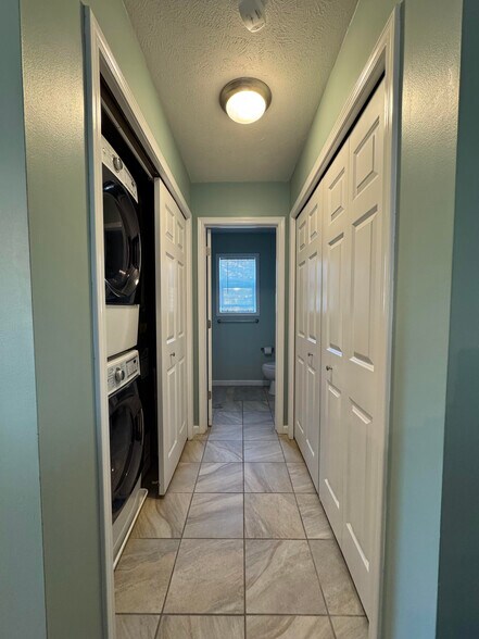 Hallway with laundry and storage - 1085 Weathervane Pl