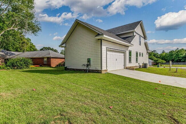 Building Photo - This luxurious new custom home in the sought-after Shadow Grove subdivision is a masterpiece of m...