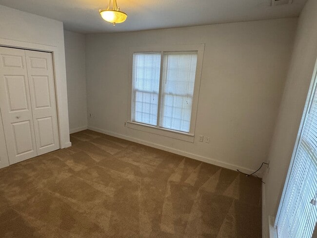 Building Photo - Beautiful 4-Bedroom Home on a Private, Tre...