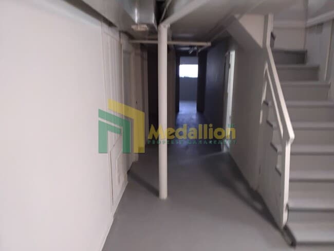 Building Photo - Spacious 5-Bedroom Brick Bungalow with Updated Interior