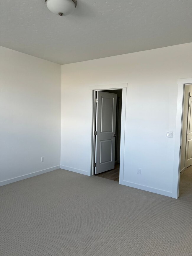 Building Photo - Introducing a brand new 4 bedroom, 3 bathr...