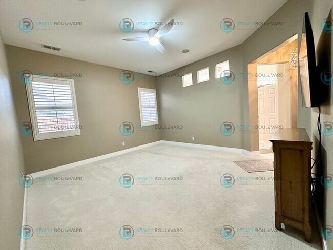 Building Photo - Open Kitchen, Expansive Living, and Covered Patio in Tranquil South Reno Near Trails, Parks & Sho...