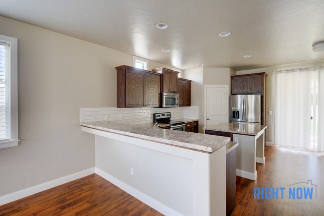 Building Photo - 4648 N Elisha Ave