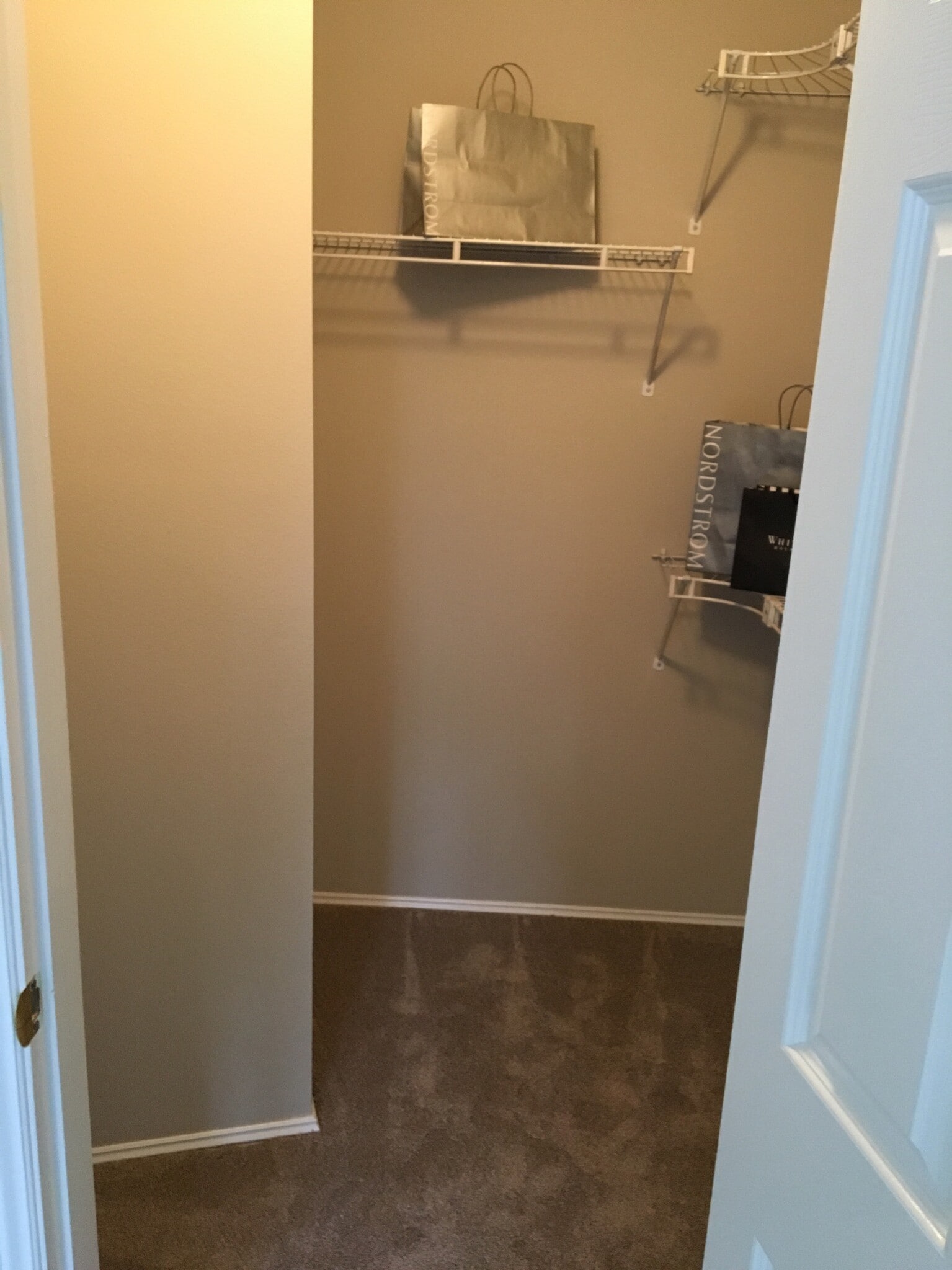 walk-in closet in master bedroom. - 9915 NE 124th St