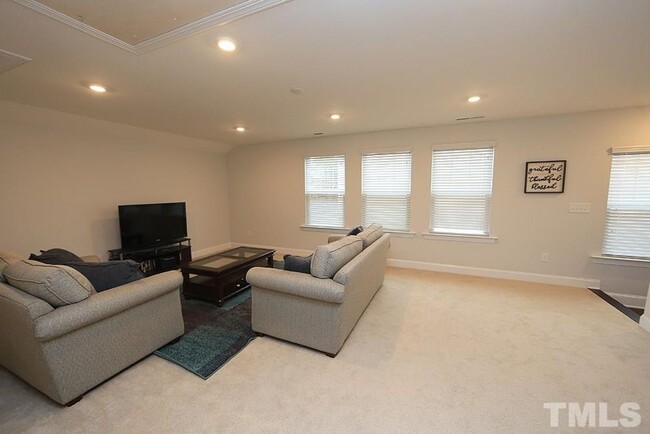 Building Photo - Main Floor Owner's Suite PLUS Main Floor G...