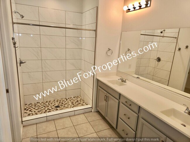 Building Photo - 10897 W Sarabella Dr