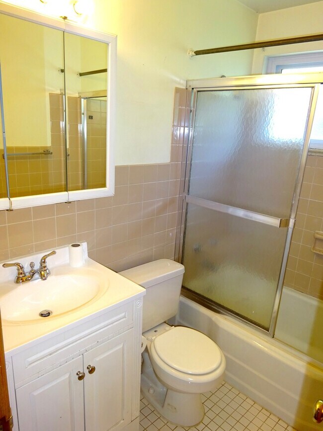 Building Photo - Two Bedroom Apartment With Hardwood Floors...
