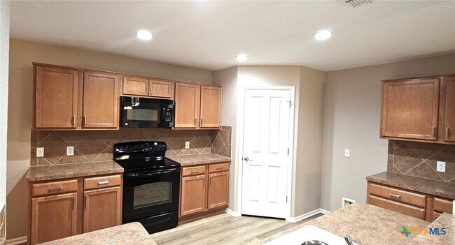 Building Photo - 6046 Mule Deer Dr