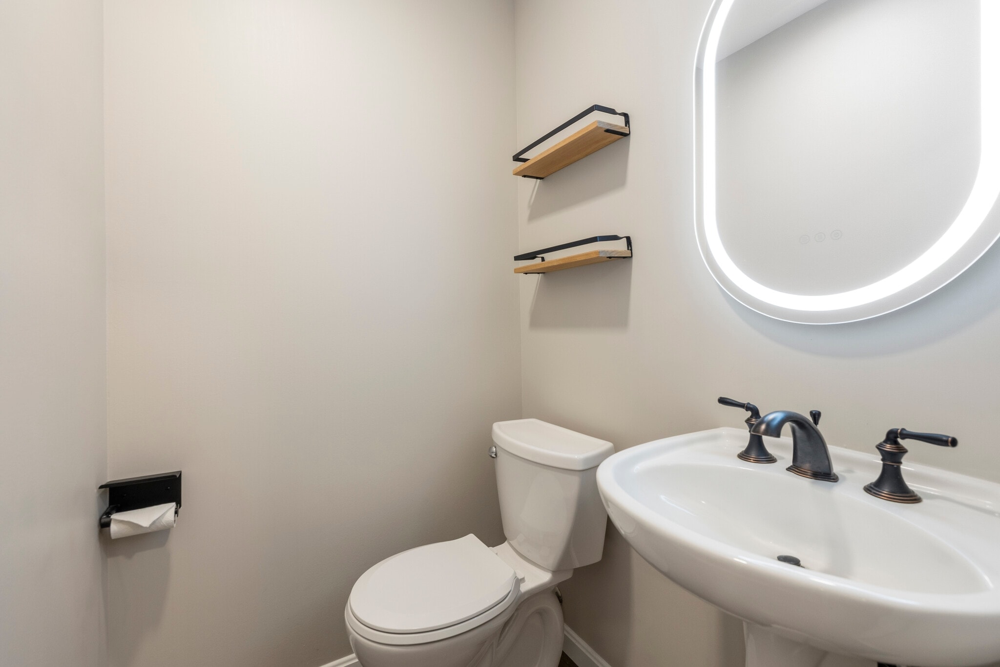 powder room on 1st floor - 4880 Chevy Chase Dr