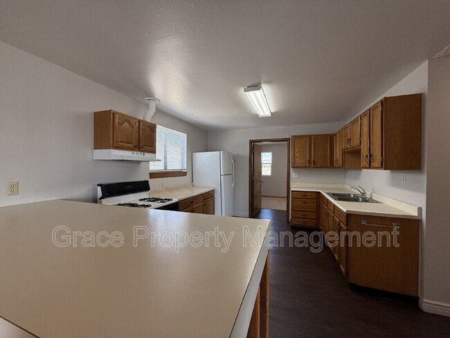 Building Photo - 1149 E 58th Ave
