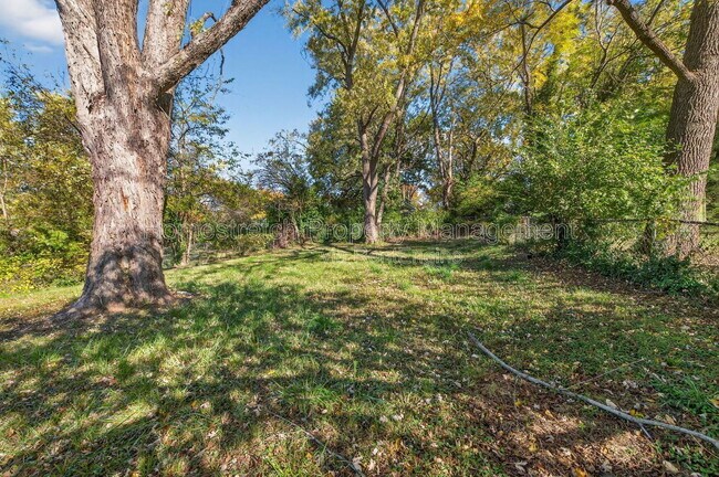 Building Photo - 6166 Emerald Ave