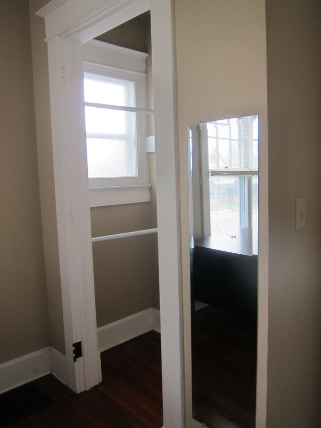 The bedroom closet and mirror. - 1525 South 7th Street