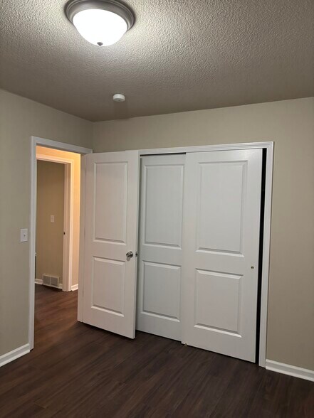 Building Photo - 8599 E H Ave