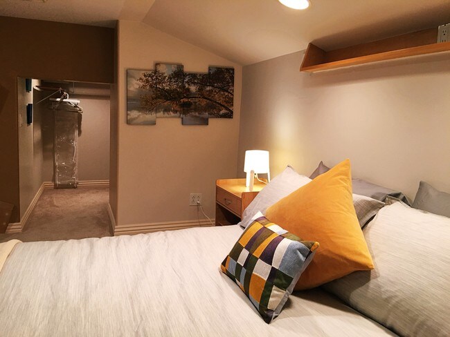 Partial view of bed & upper loft area - 8567 Walnut Dr