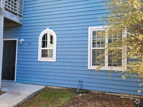 Building Photo - Renovated first floor condo with community...