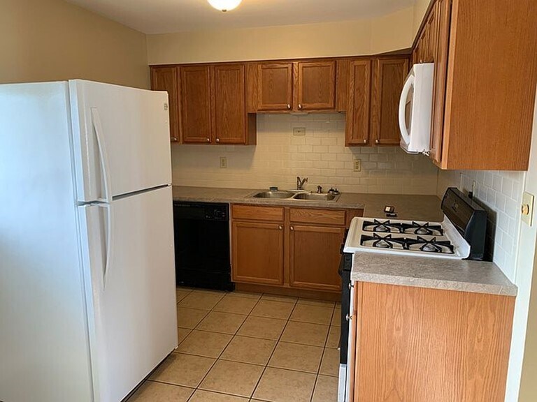 Kitchen in upper level - 1528 W Daytona Dr