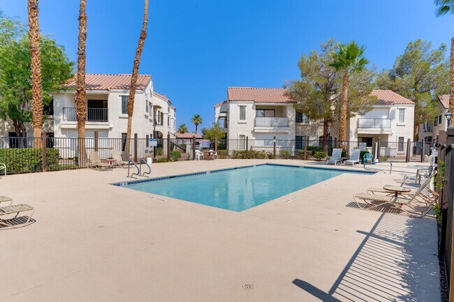 Building Photo - Stylish Upstairs Condo with Dual Primary S...