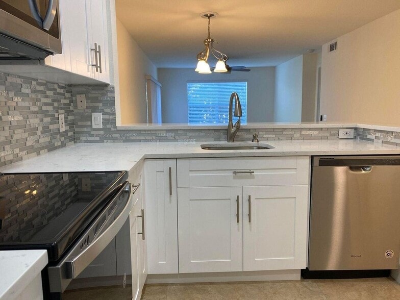 Building Photo - 1885 Palm Cove Blvd