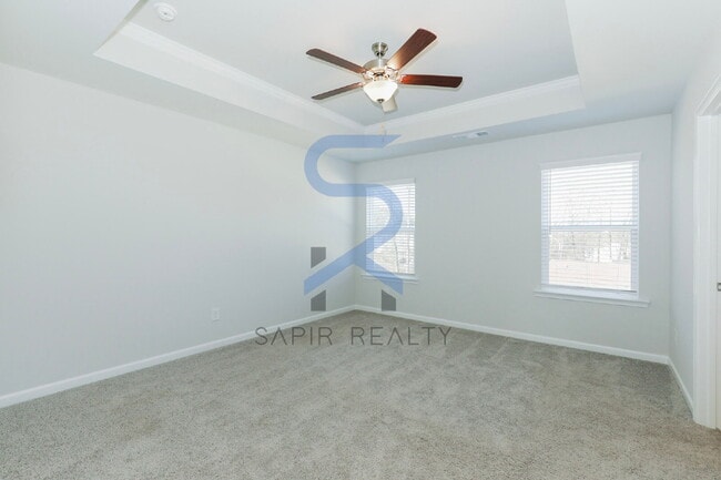 Building Photo - Move in before February 28th and choose your reward: a $250 Amazon Gift Card or a 55" Smart TV!