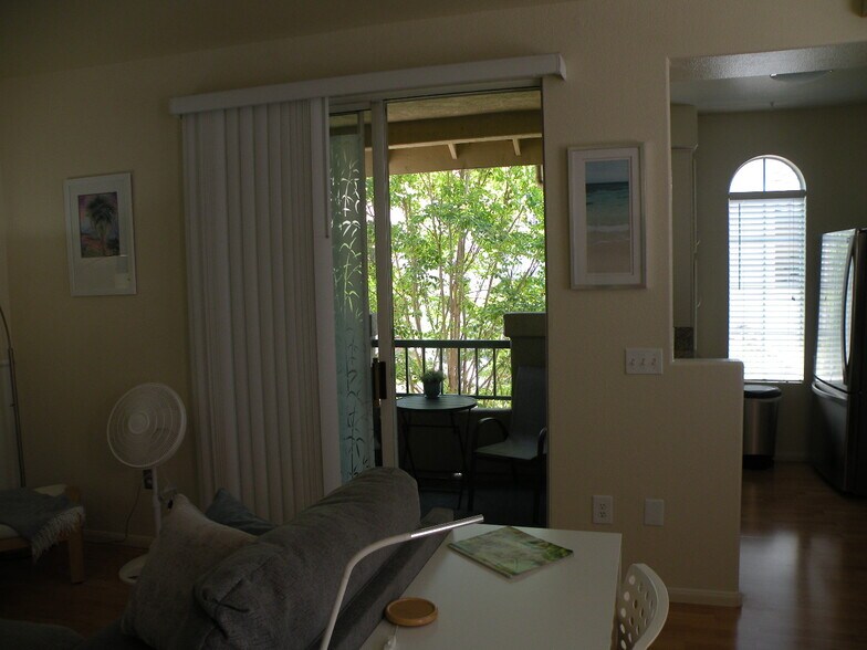 Living room looking out sliding door - 8680 New Salem St