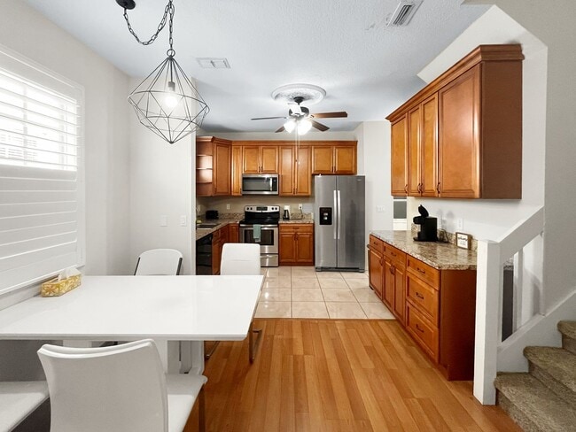 Building Photo - Spacious 4-Bedroom Townhome with Lake Views in Desirable Willow Lake Community