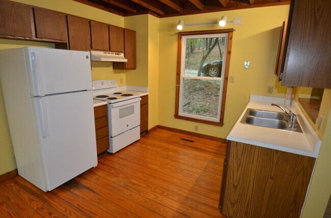 Building Photo - Private Wooded Retreat Near UNC with Vaulted Ceilings & Cozy Woodstove