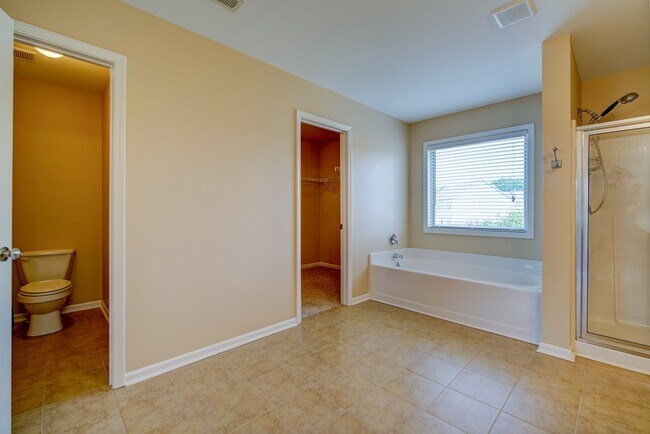 Building Photo - Gorgeous 4/5 BR, 3 BA, 2 Car Garage Home with Fenced Backyard and Large Storage Unit