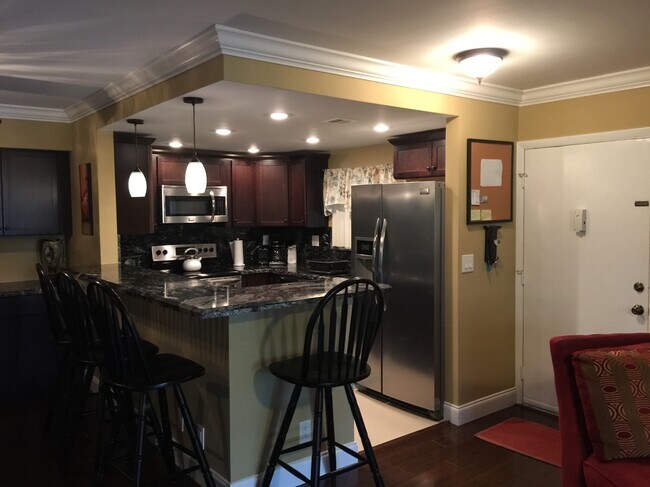 kitchen & front door - 123 Deer Creek Blvd