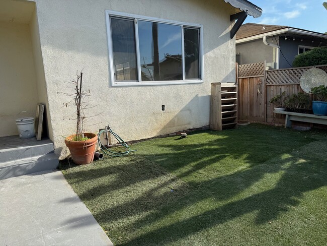 Front yard with some plants and planter - 11954 Eucalyptus Ave