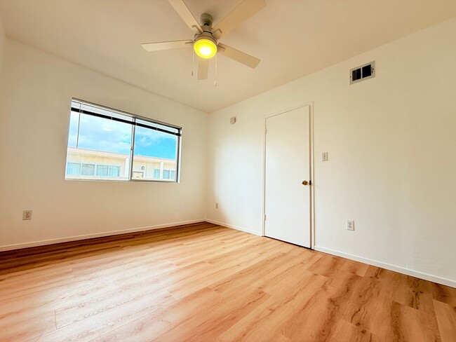 Building Photo - Stylish & Spacious 2-Bedroom Condo for Ren...