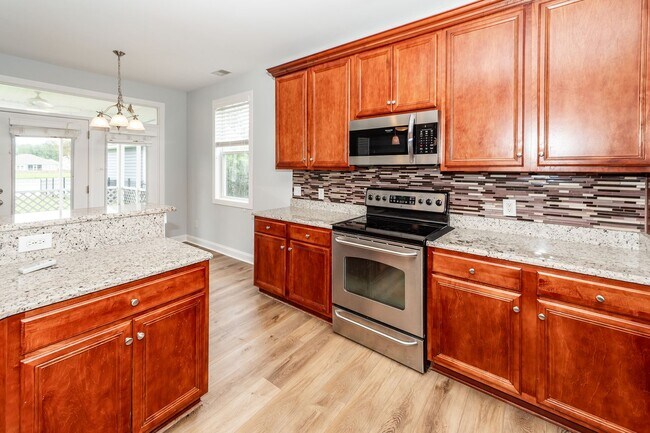 Building Photo - 4 Bedroom, 2.5 Bathroom Home in Reminisce ...