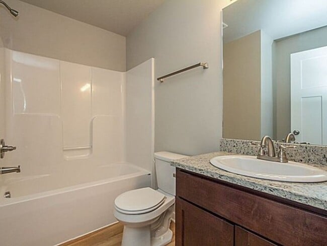 Building Photo - Twin Gates Townhomes - End Unit