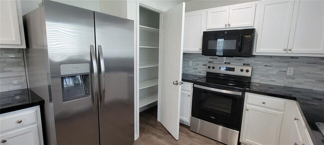 Building Photo - 9543 Maxson Dr