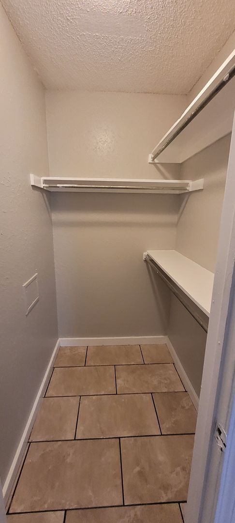 Building Photo - 2 Bedroom, 1.5 Bathroom 1st Floor Condo wi...