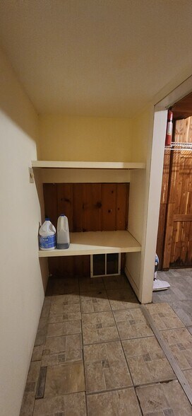 More storage shelves - 702 Plum St SW