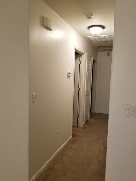 Hallway - Storage Closet and 2nd & 3rd Bedrooms on Left - 2756 Chardonnay Ln