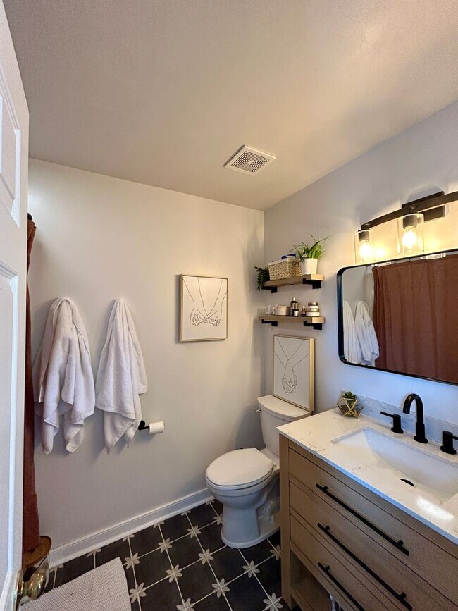 Building Photo - 3BR End Unit w/ Garage, Deck, Patio & 2 Fireplaces, Private fenced Backyard