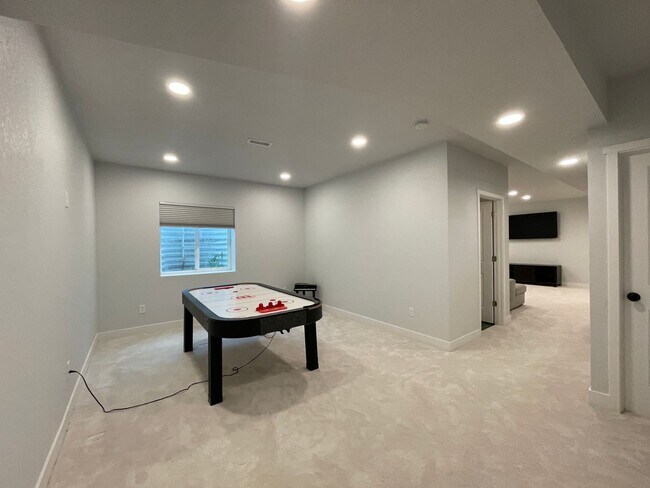 Building Photo - Live Lavishly in Harmony Ridge- Fully Furnished 5-Bedroom Dream Home with Backyard Oasis & Speake...