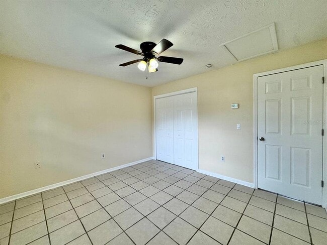 Building Photo - 10015 N Aster Ave