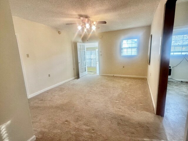 Living room with the Entrance from the Sunroom. - 502 E Tombigbee St