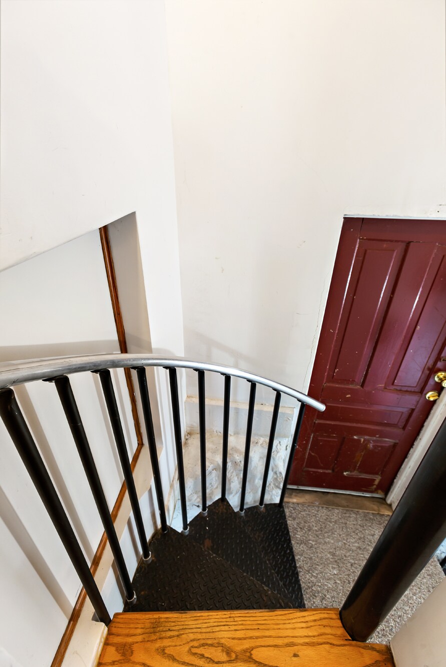 Circular stairway side - 1209 E University Ave