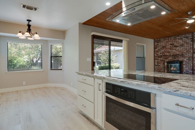 Building Photo - Bright and Stylish 4BD/2BA Home with 3 Car...