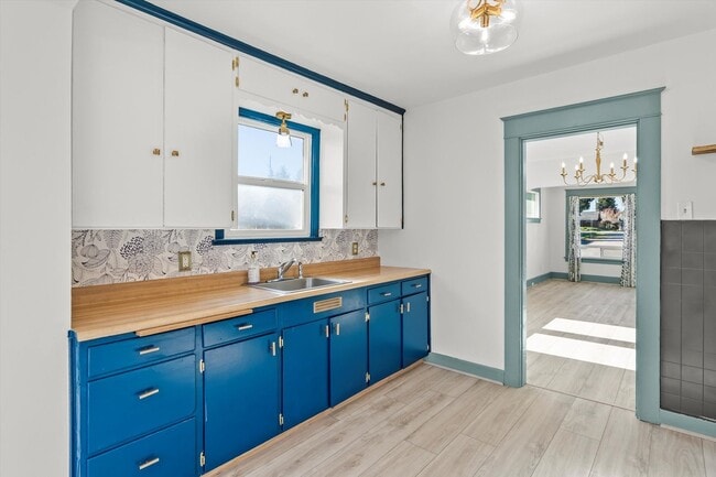 Building Photo - Spacious Tacoma Rental Featuring Large Yard & Entertainer’s Deck