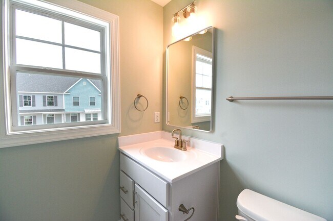 Building Photo - New END UNIT Townhome with Pond View and D...